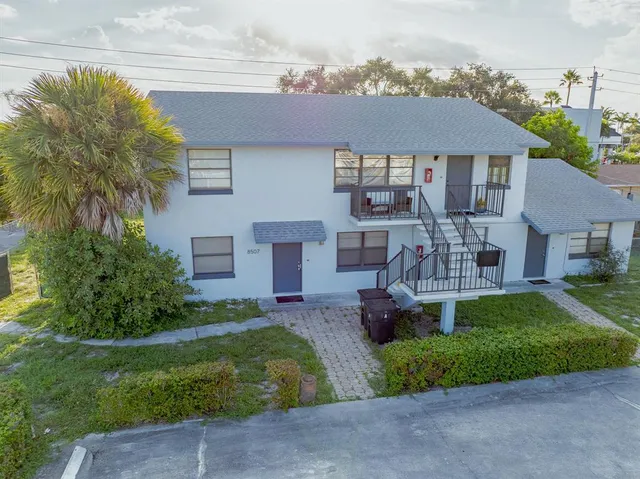 a house view with a outdoor space