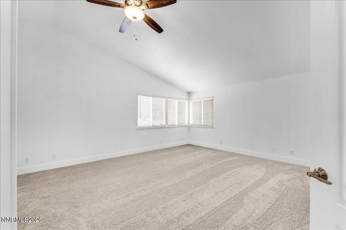 2329 Red Maple Court Reno, NV 89523 - Photo 20 of 39 an empty room with a window and a ceiling fan