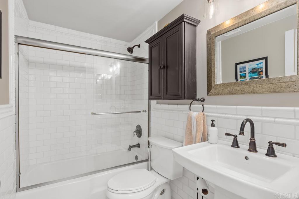 262 Chapalita Drive Encinitas, CA 92024 - Photo 14 of 30 a bathroom with a sink mirror shower and toilet