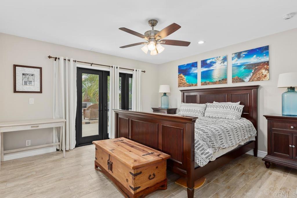 262 Chapalita Drive Encinitas, CA 92024 - Photo 15 of 30 a bedroom with a bed and a dresser