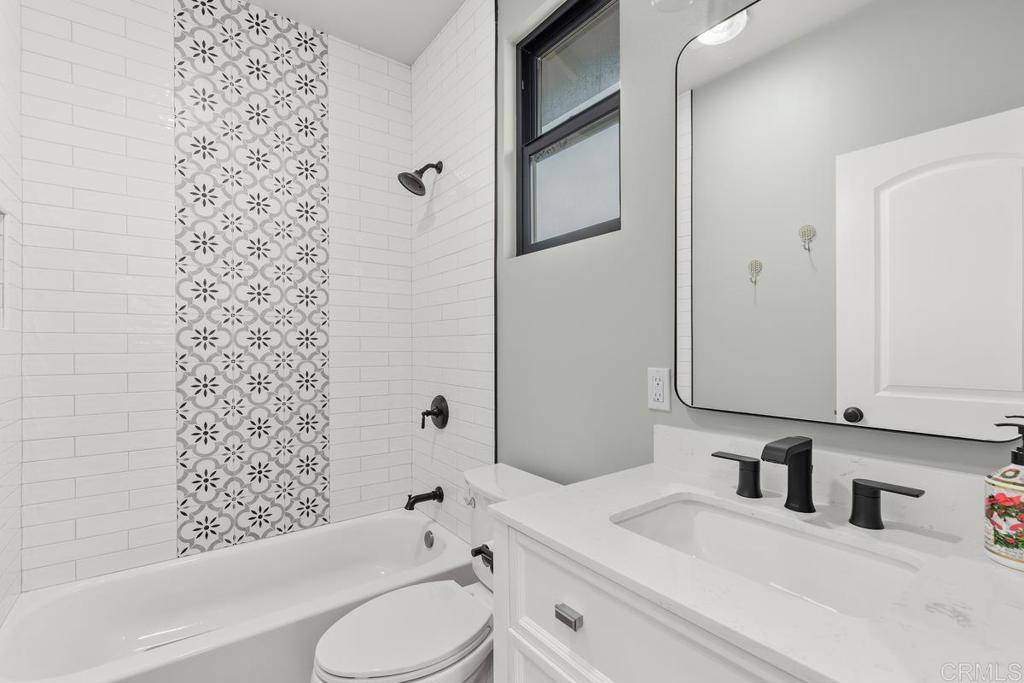 262 Chapalita Drive Encinitas, CA 92024 - Photo 30 of 30 a bathroom with a sink toilet and shower