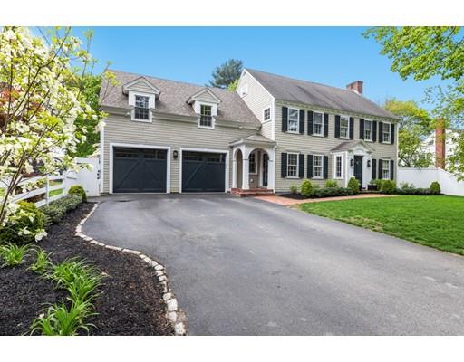 50 Garrison Road Hingham, MA 02043 - Photo 2 of 30 a front view of a house with a garden