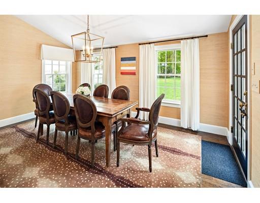 50 Garrison Road Hingham, MA 02043 - Photo 9 of 30 a view of a dining room with furniture window and wooden floor
