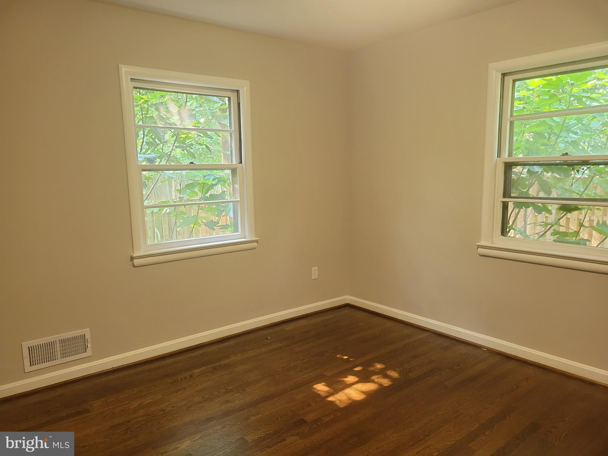 2250 North Quantico Street Arlington, VA 22205 - Photo 15 of 47 a view of a room with wooden floor and window