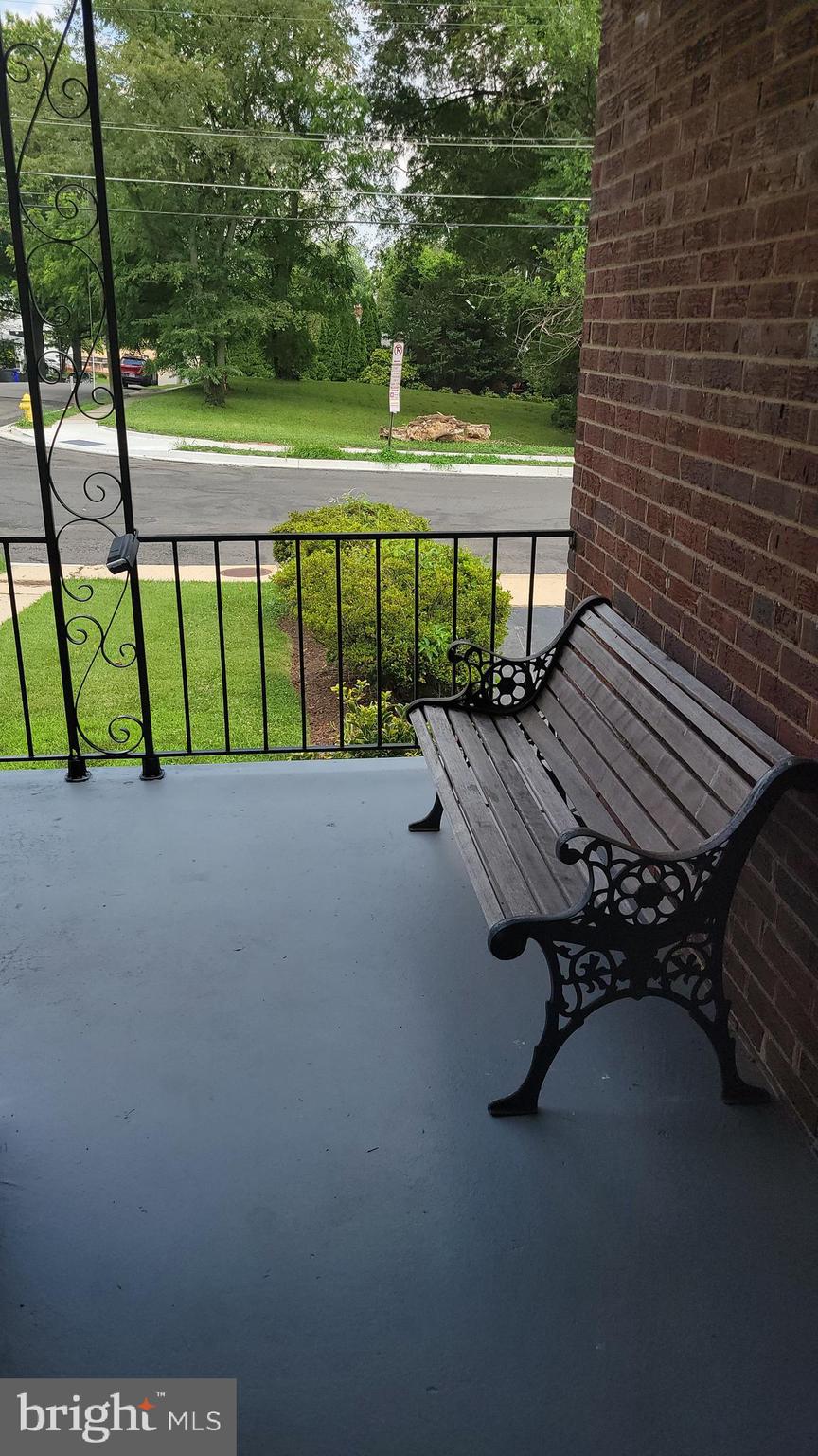 2250 North Quantico Street Arlington, VA 22205 - Photo 3 of 47 a view of a swimming pool with a yard
