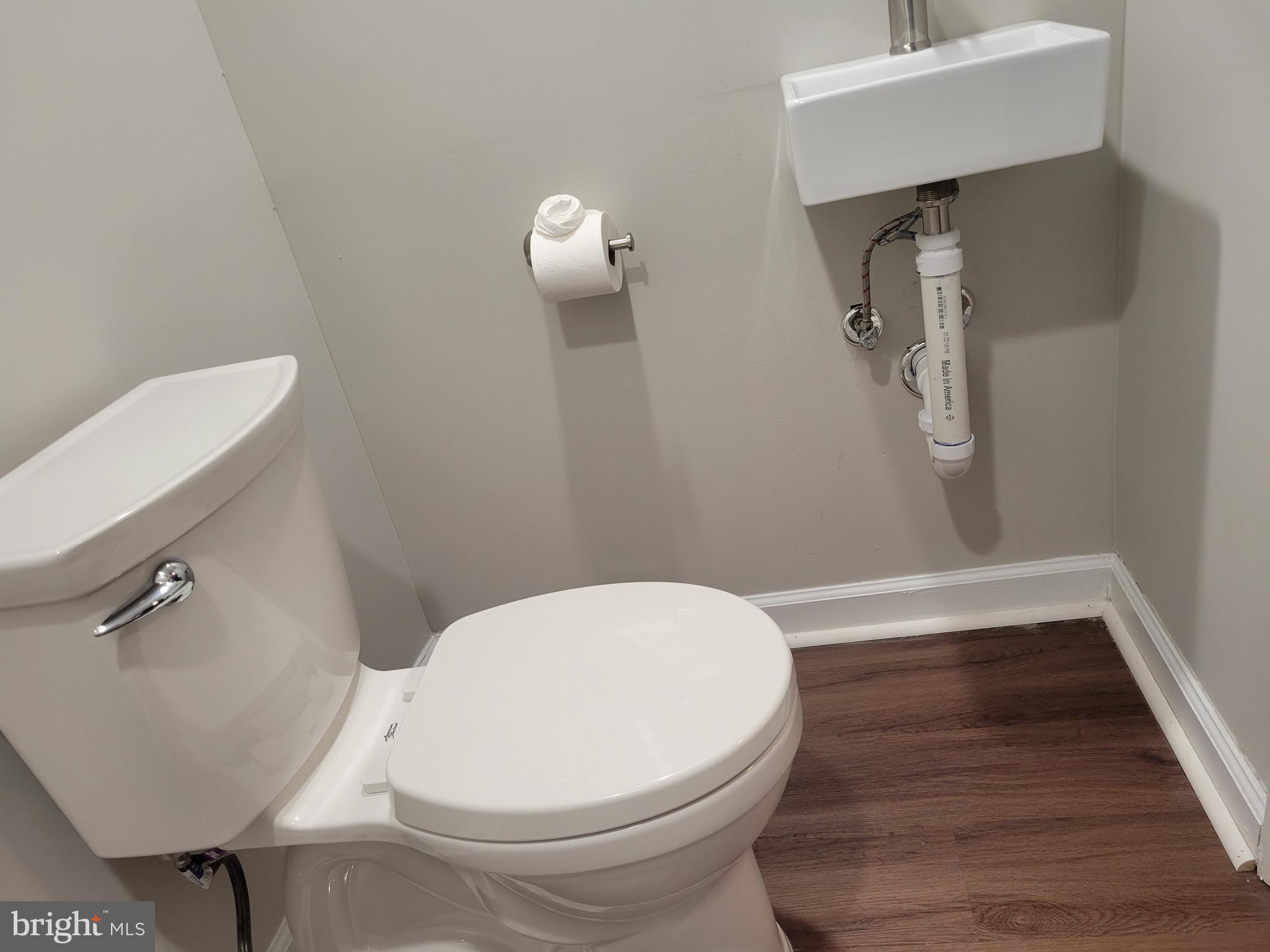 2250 North Quantico Street Arlington, VA 22205 - Photo 40 of 47 a bathroom with a toilet and a sink