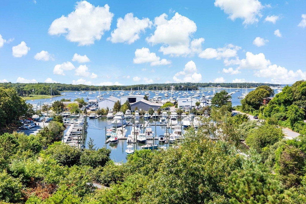 1090 Shore Road, Unit 4 Bourne, MA 02559 - Photo 32 of 42 a view of a city with lots of trees