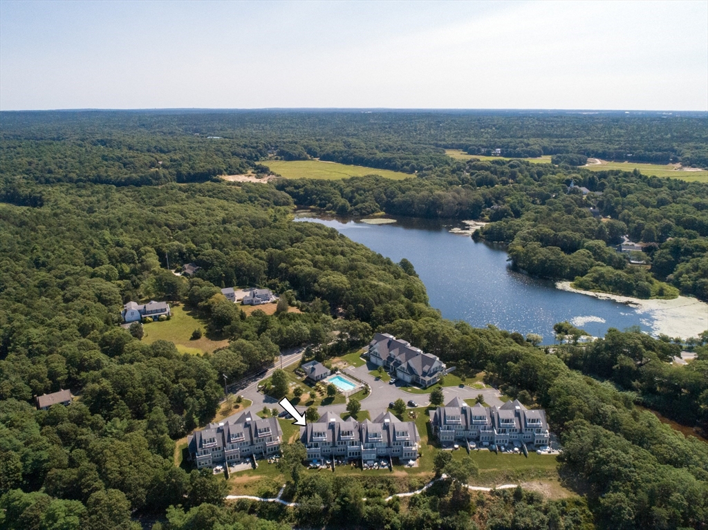 1090 Shore Road, Unit 4 Bourne, MA 02559 - Photo 40 of 42 an aerial view of multiple house
