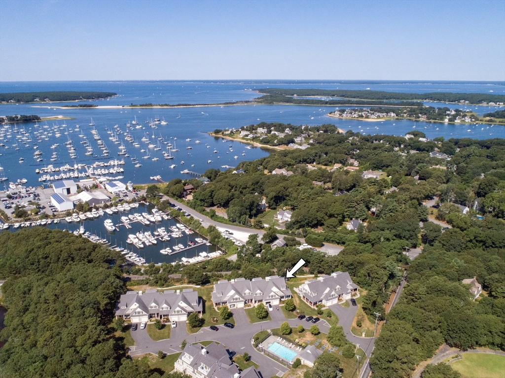 1090 Shore Road, Unit 4 Bourne, MA 02559 - Photo 42 of 42 a view of a city with an ocean view