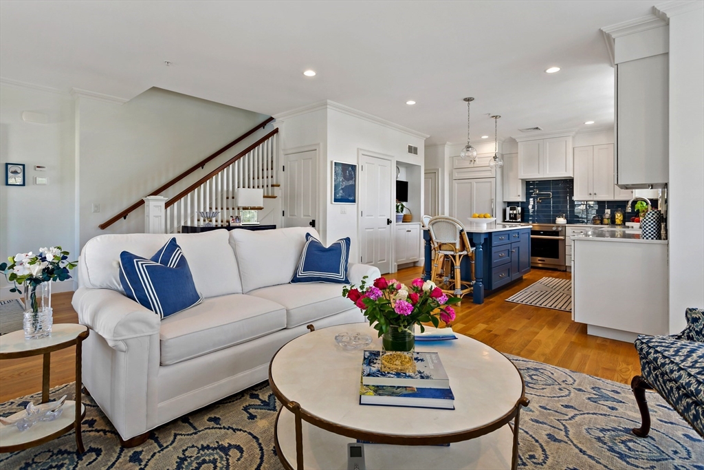 1090 Shore Road, Unit 4 Bourne, MA 02559 - Photo 6 of 42 a living room with furniture kitchen and a dining table