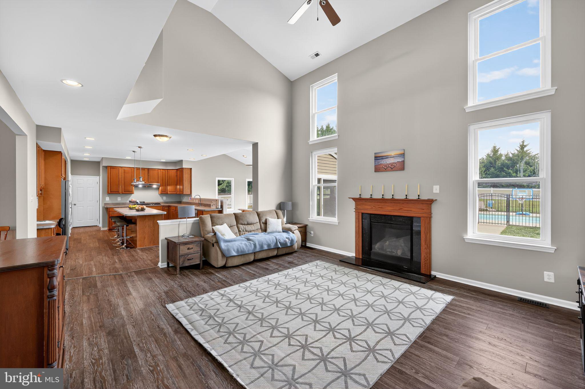 562 Partridge Court Mickleton, NJ 08056 - Photo 14 of 33 a living room with furniture fireplace and window