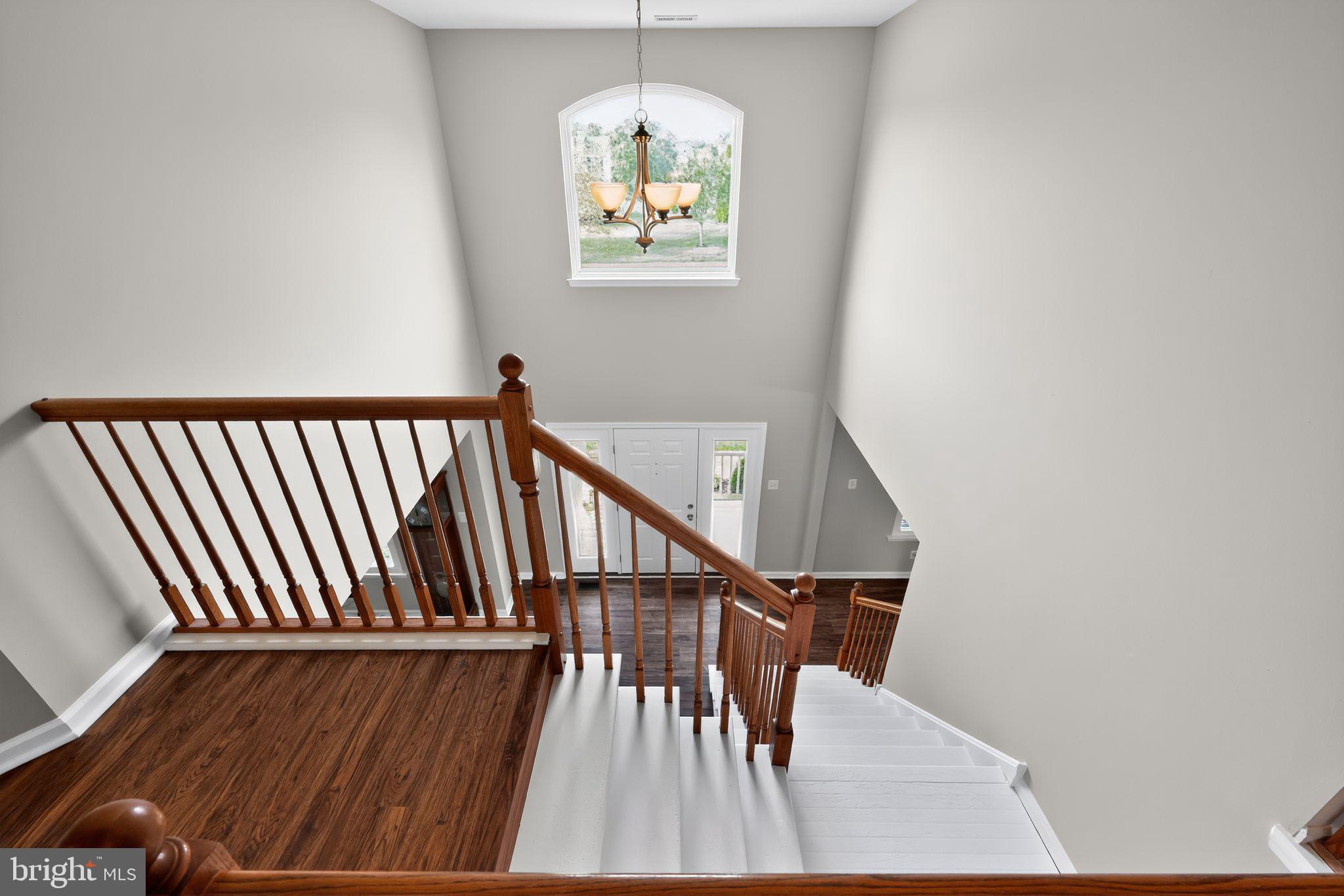 562 Partridge Court Mickleton, NJ 08056 - Photo 18 of 33 a view of entryway with wooden floor