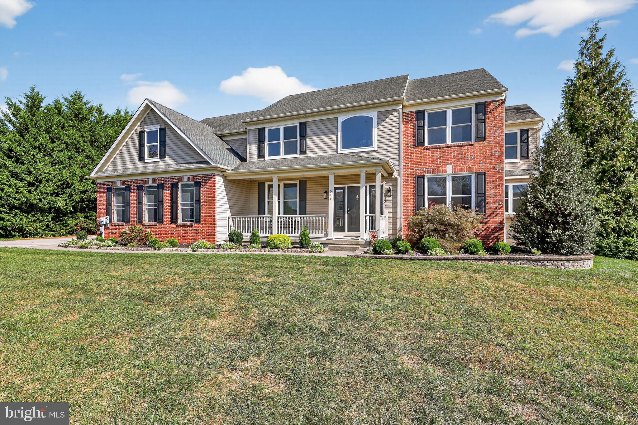 562 Partridge Court Mickleton, NJ 08056 - Photo 2 of 33 front view of a house with a yard