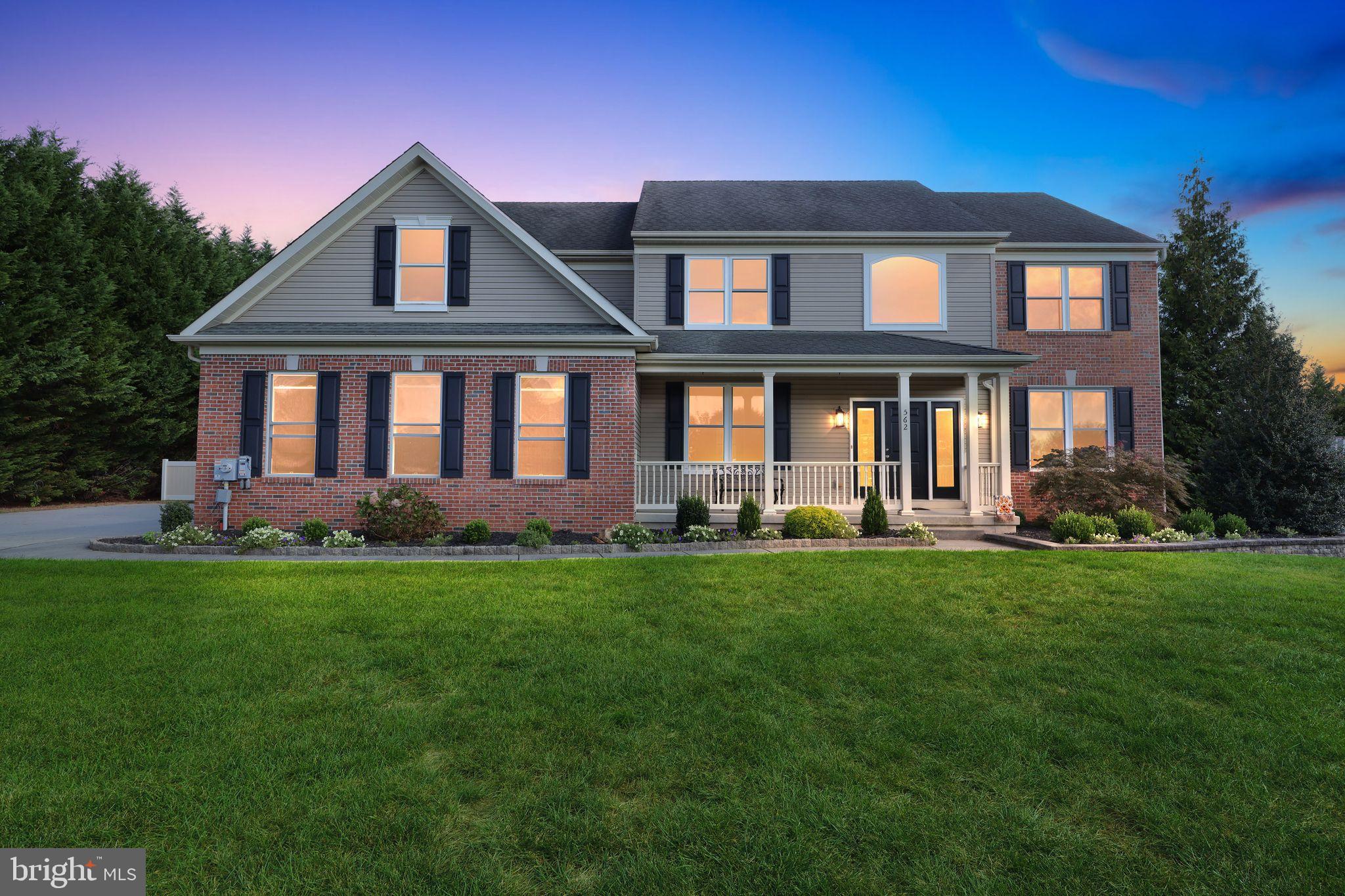 562 Partridge Court Mickleton, NJ 08056 - Photo 33 of 33 a front view of a house with a yard