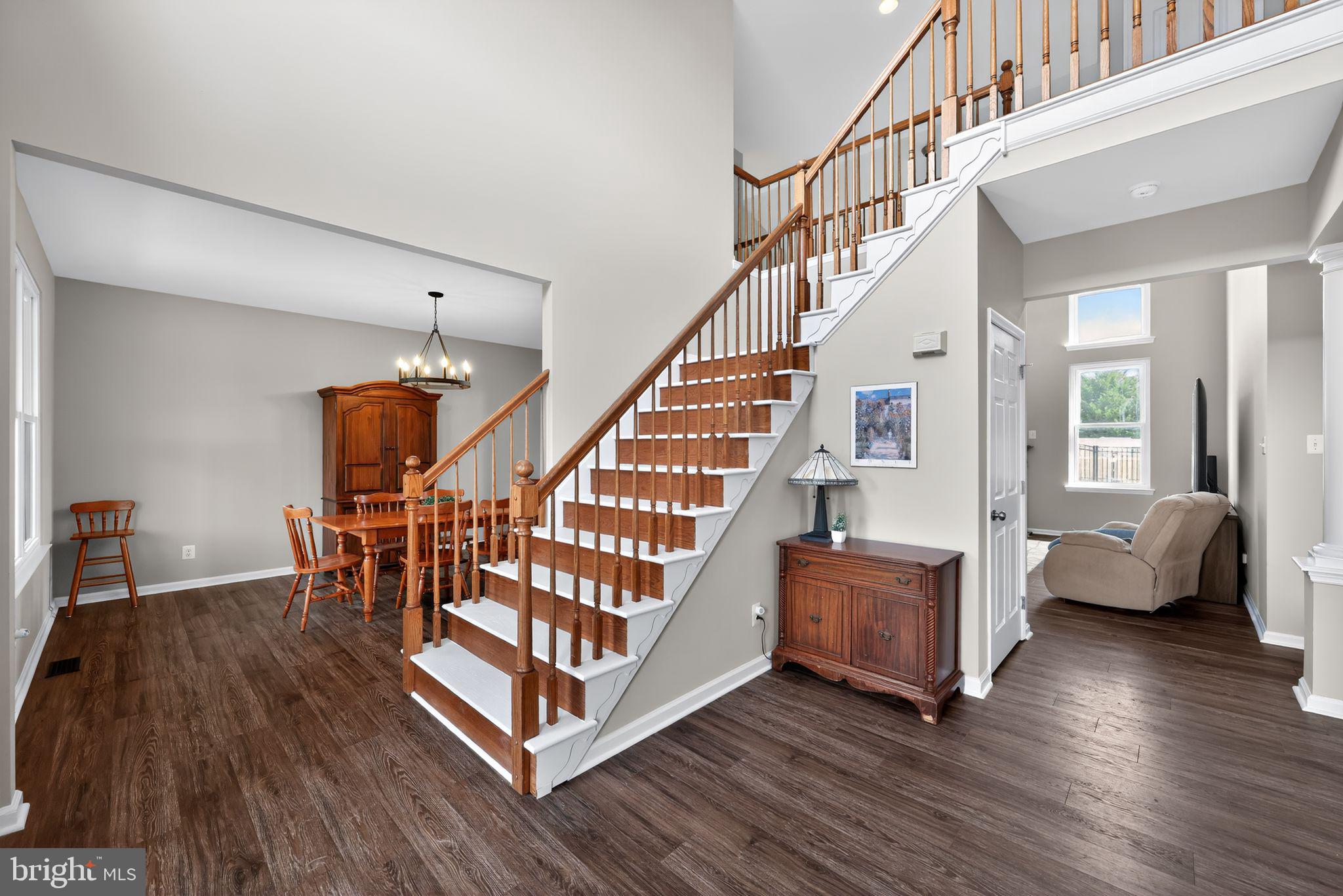 562 Partridge Court Mickleton, NJ 08056 - Photo 5 of 33 a view of entryway with wooden floor and stairs