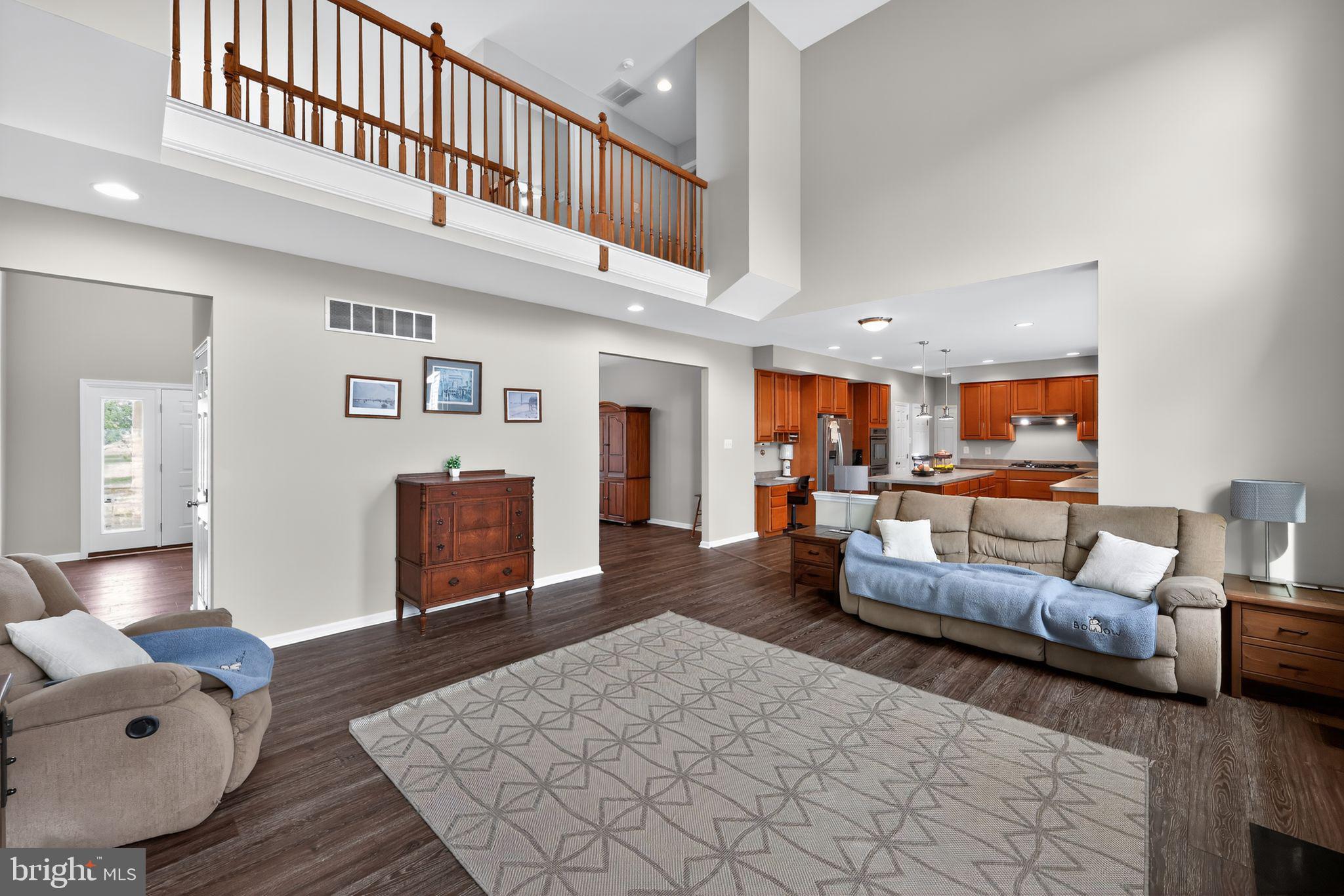 562 Partridge Court Mickleton, NJ 08056 - Photo 8 of 33 a living room with furniture and wooden floor
