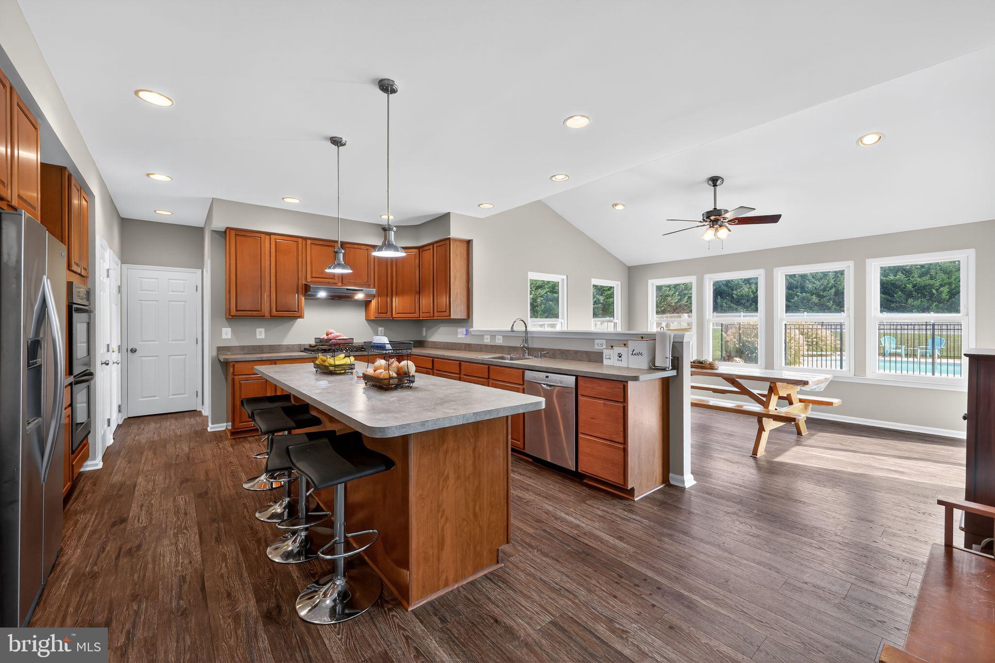 562 Partridge Court Mickleton, NJ 08056 - Photo 9 of 33 a kitchen with a sink appliances and wooden floor