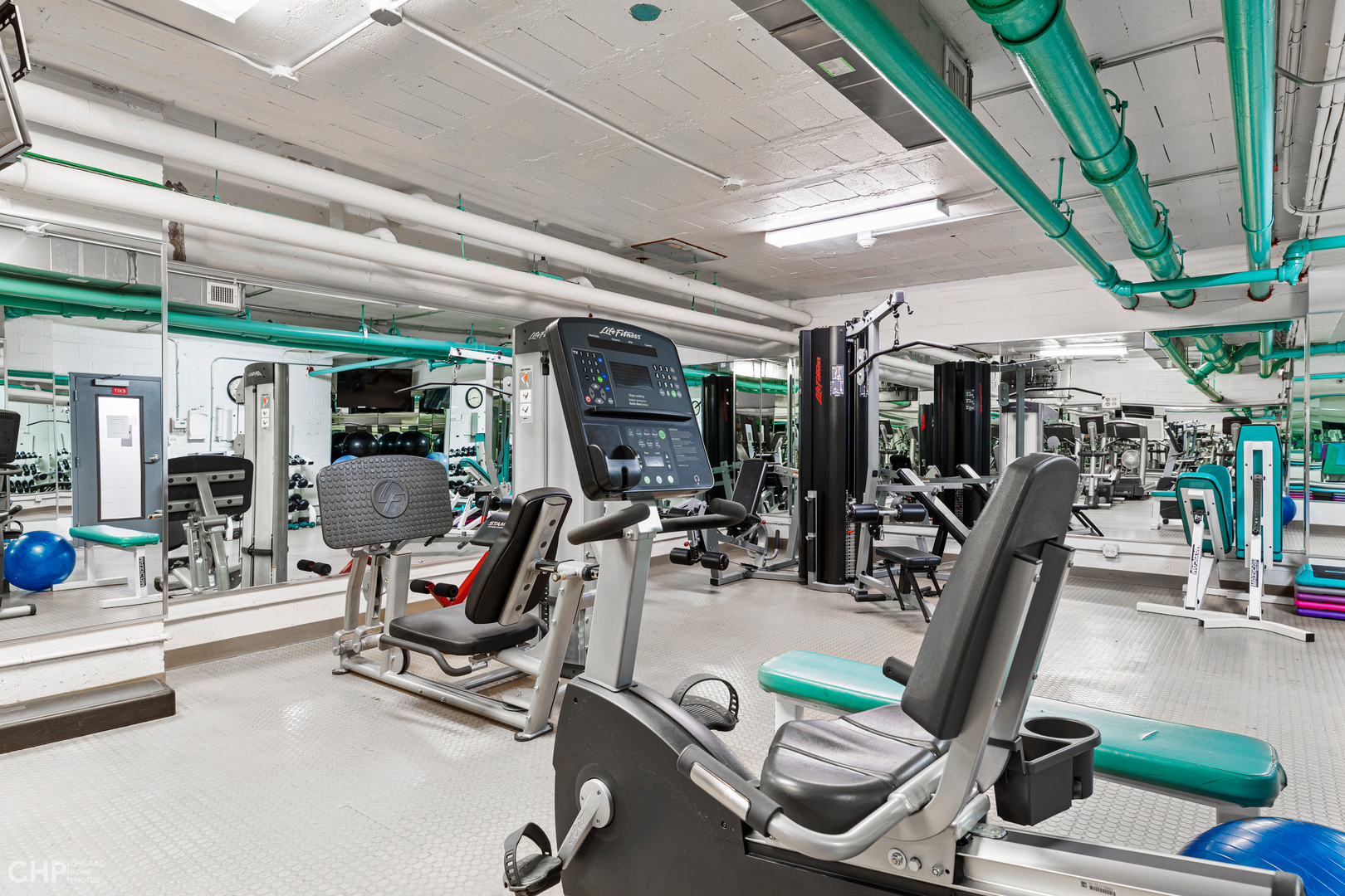 850 North Dewitt Place, Unit 4A Chicago, IL 60611 - Photo 21 of 22 a view of a room with gym equipment