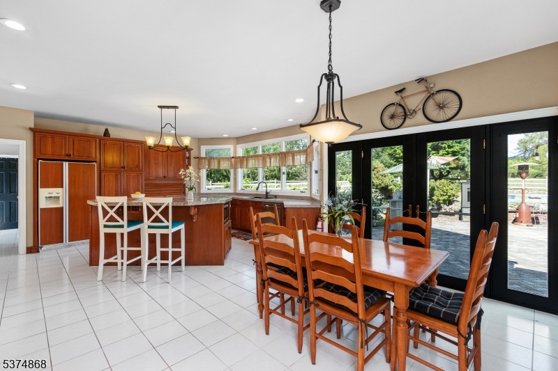 334 West Valley Brook Road Califon, NJ 07830 - Photo 11 of 44 a view of a dining room and hall with furniture