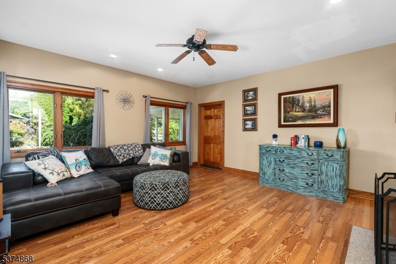 334 West Valley Brook Road Califon, NJ 07830 - Photo 16 of 44 a living room with furniture and a window