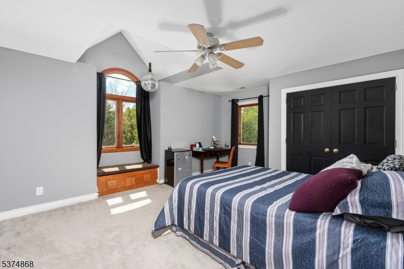 334 West Valley Brook Road Califon, NJ 07830 - Photo 23 of 44 a bed room with two beds and a window