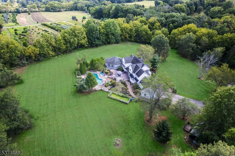 334 West Valley Brook Road Califon, NJ 07830 - Photo 29 of 44 a view of a lake with a yard