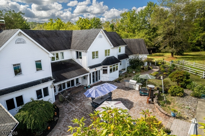 334 West Valley Brook Road Califon, NJ 07830 - Photo 34 of 44 a aerial view of a house with a yard