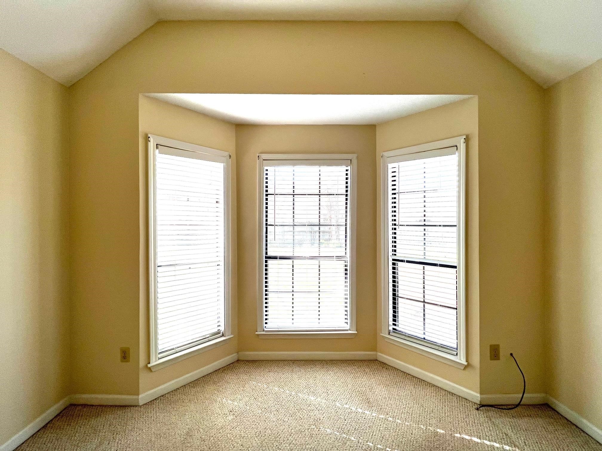 203 Glen Echo Road Collierville, TN 38017 - Photo 7 of 12 a view of an empty room and a window