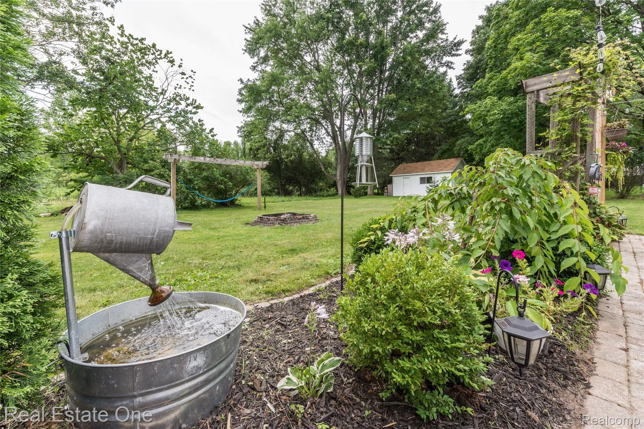 487 Henderson Road Howell, MI 48855 - Photo 21 of 27 Established Perennial Gardens