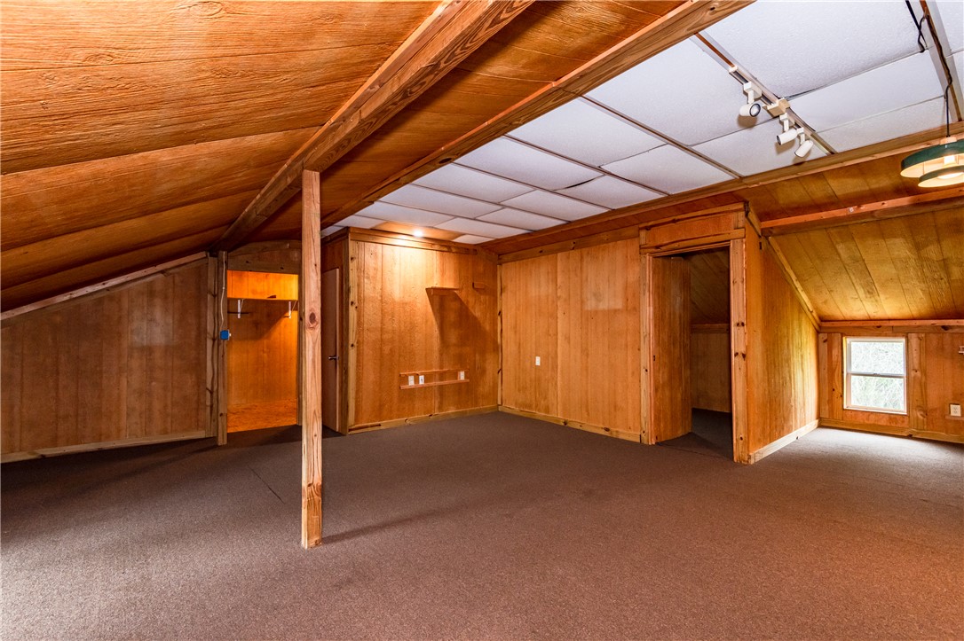 6750 Little Twin Road Germantown, OH 45327 - Photo 58 of 88 This spacious attic space features natural wood paneling and offers versatile living options.