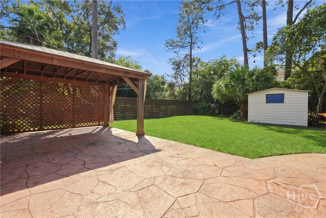 209 Brandywine Road Savannah, GA 31405 - Photo 35 of 45 STAMPED CONCRETE W/PERGOLA