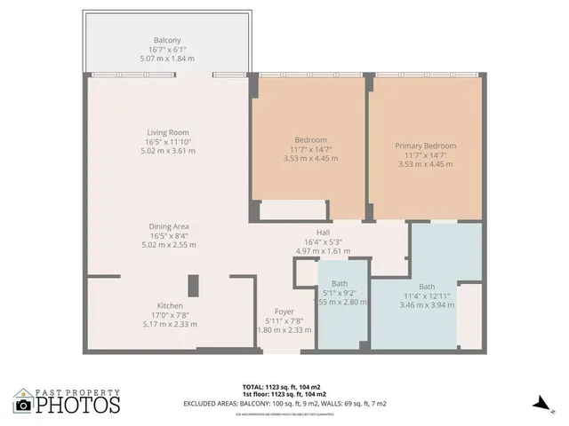 a kitchen with a refrigerator and a sink