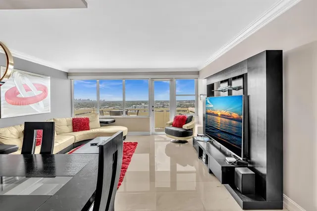 a room with furniture and a flat screen tv