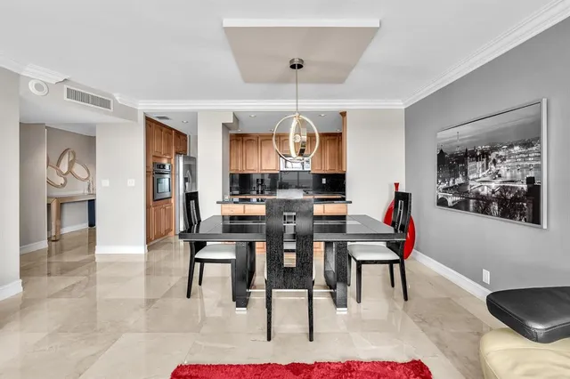 a view of a dining room with furniture