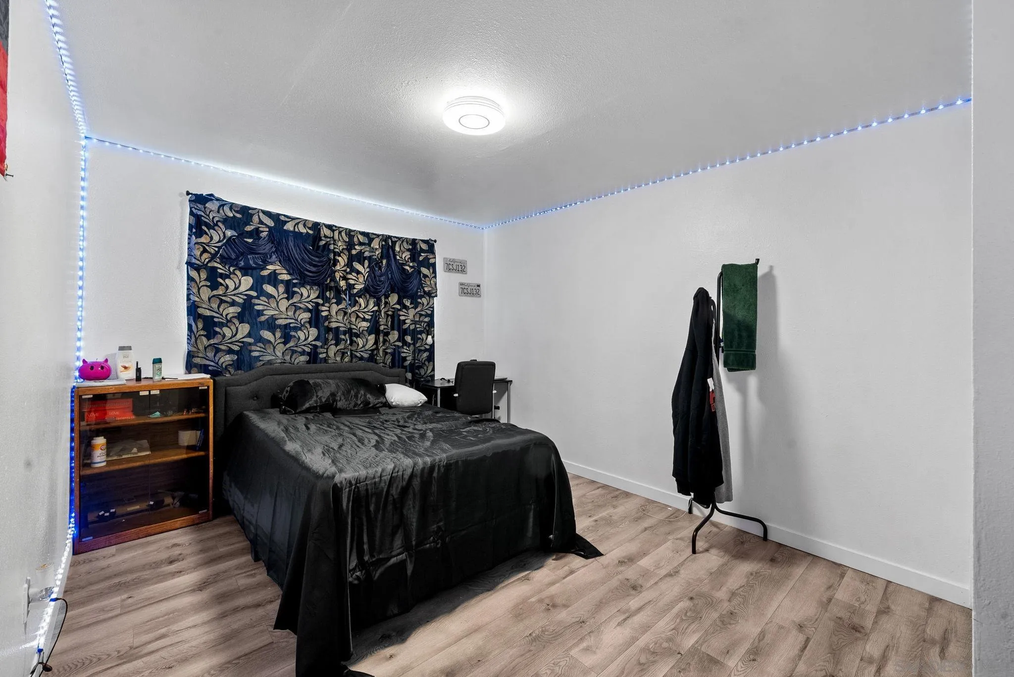 5872-streamview Streamview Drive San Diego, CA 92105 - Photo 5 of 11 a bedroom with a bed and a window