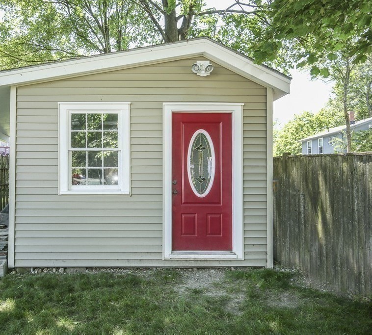 31 Fairchild Avenue Saugus, MA 01906 - Photo 21 of 24 a front view of a house with garden