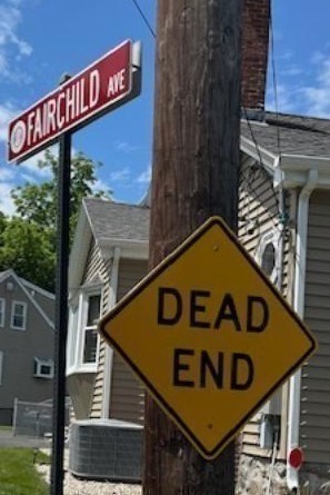 31 Fairchild Avenue Saugus, MA 01906 - Photo 24 of 24 a street sign on a pole on a street