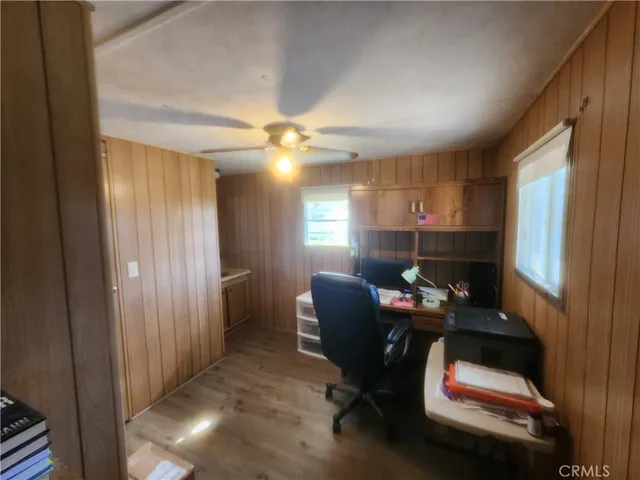 a workspace with furniture and window