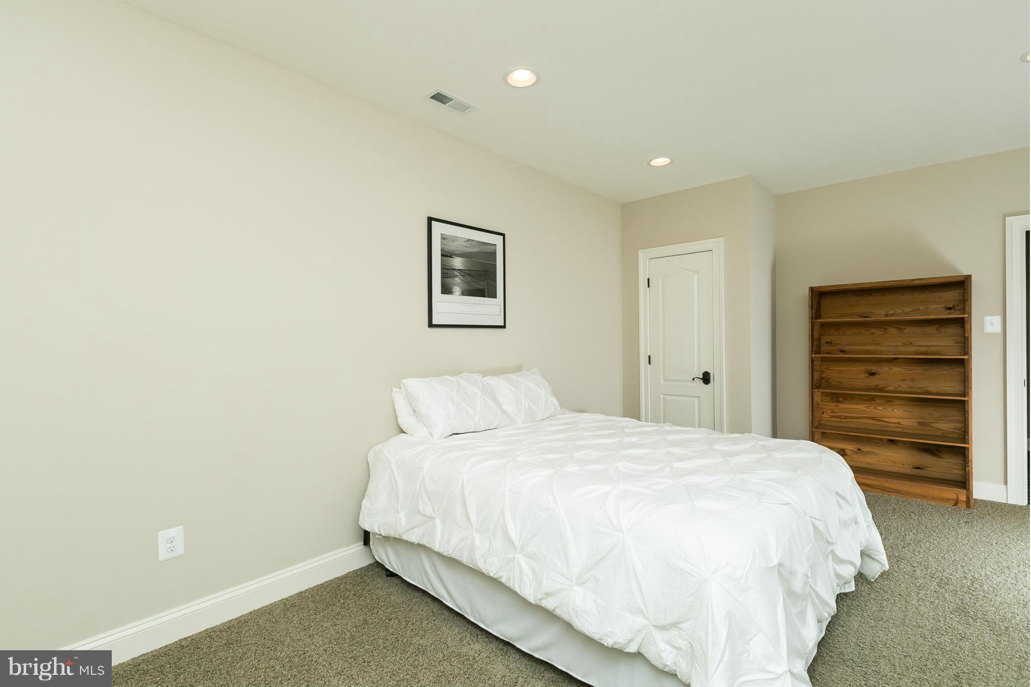 13905 Foxland Road Phoenix, MD 21131 - Photo 14 of 30 a bedroom with a bed and a closet