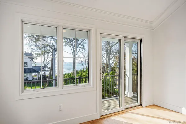 a view of a room that has a large window