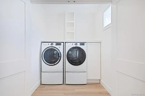 a utility room with dryer and washer