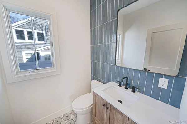 a bathroom with a sink and a toilet