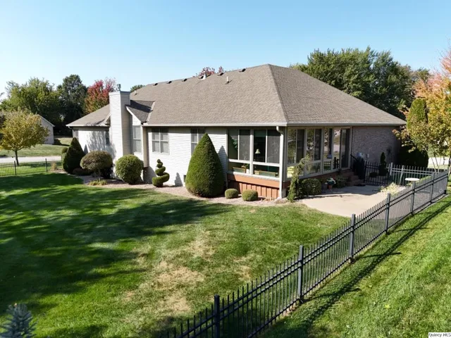 a house with garden in front of it