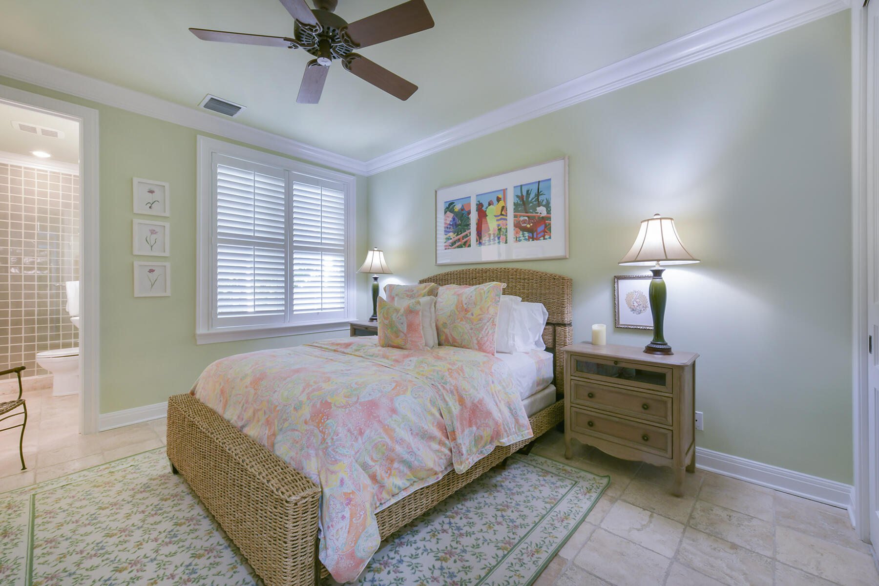 25 Sunset Key Drive Key West, FL 33040 - Photo 14 of 33 a bedroom with a bed and a chandelier