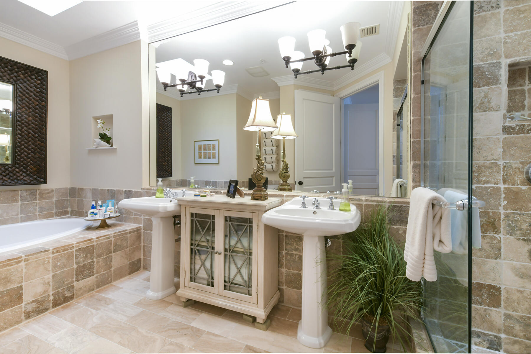25 Sunset Key Drive Key West, FL 33040 - Photo 21 of 33 a bathroom with a sink a mirror and a bathtub