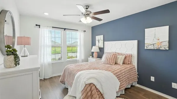 a kitchen with sink refrigerator and cabinets