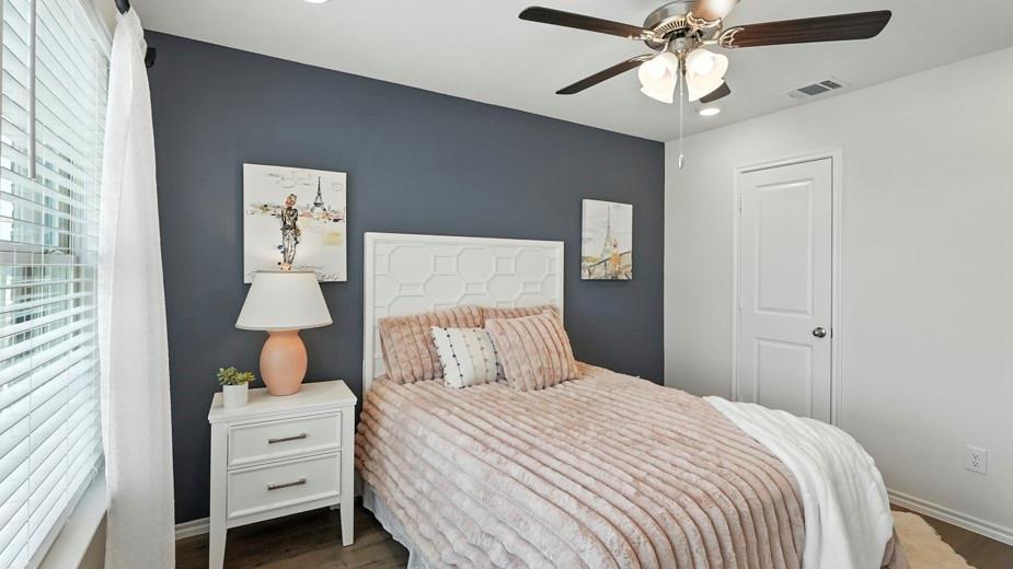 1911 Reveille Way Terrell, TX 75160 - Photo 9 of 39 Bedroom with wood finished floors, a ceiling fan, and recessed lighting