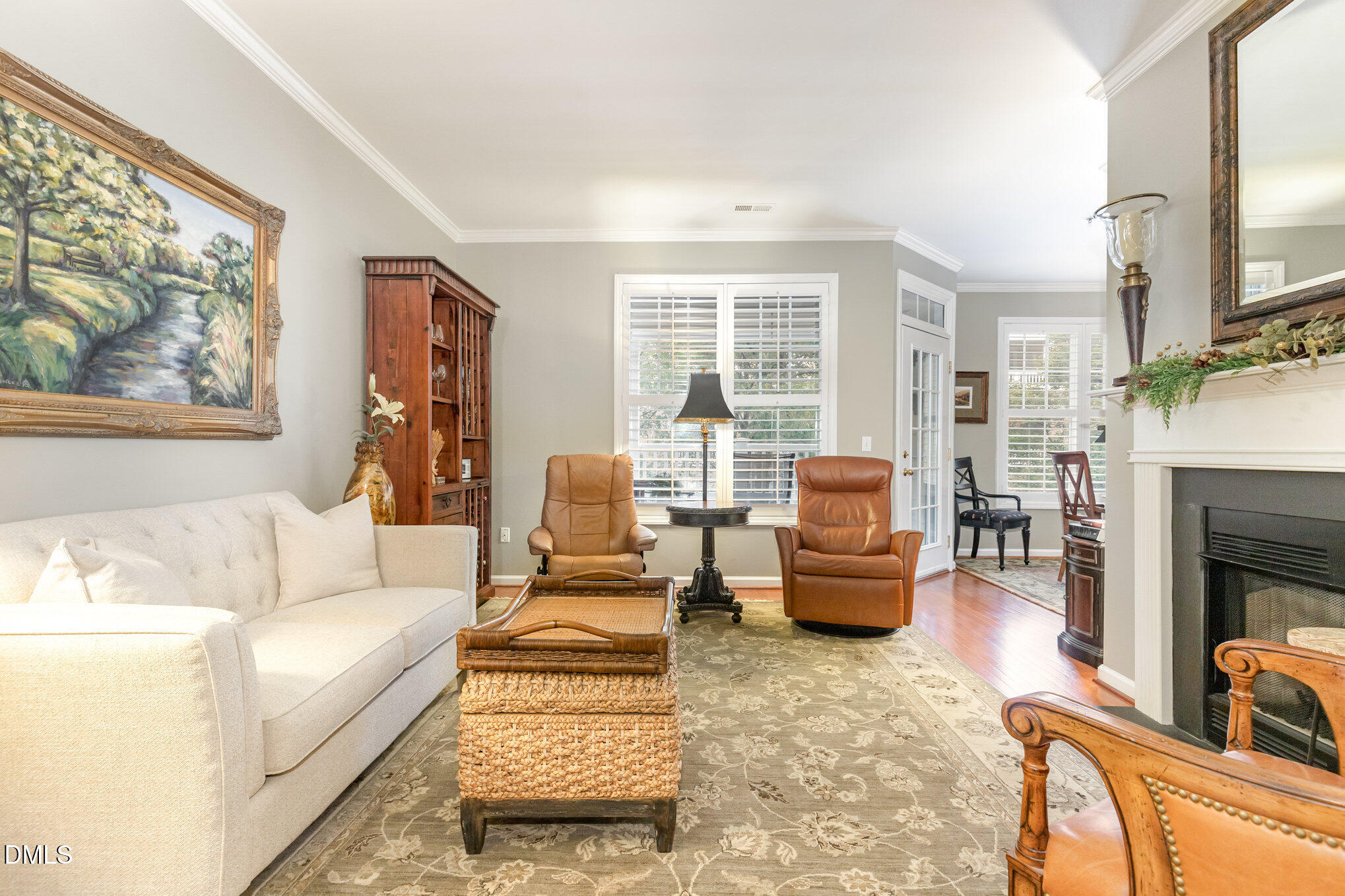 3121 Hemlock Forest Circle, Unit 203 Raleigh, NC 27612 - Photo 13 of 33 a living room with furniture and a fireplace
