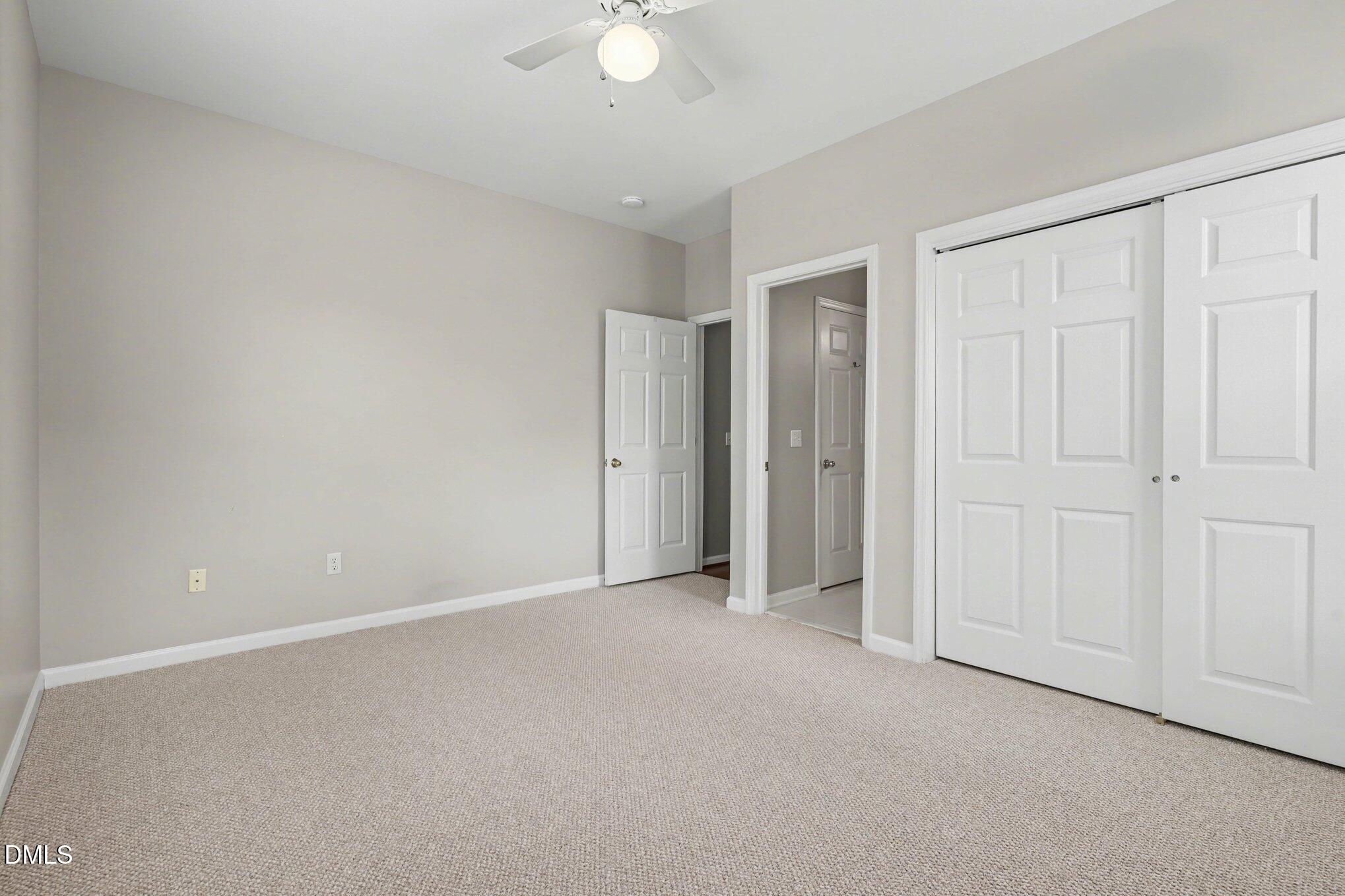 3121 Hemlock Forest Circle, Unit 203 Raleigh, NC 27612 - Photo 22 of 33 an empty room with closet area