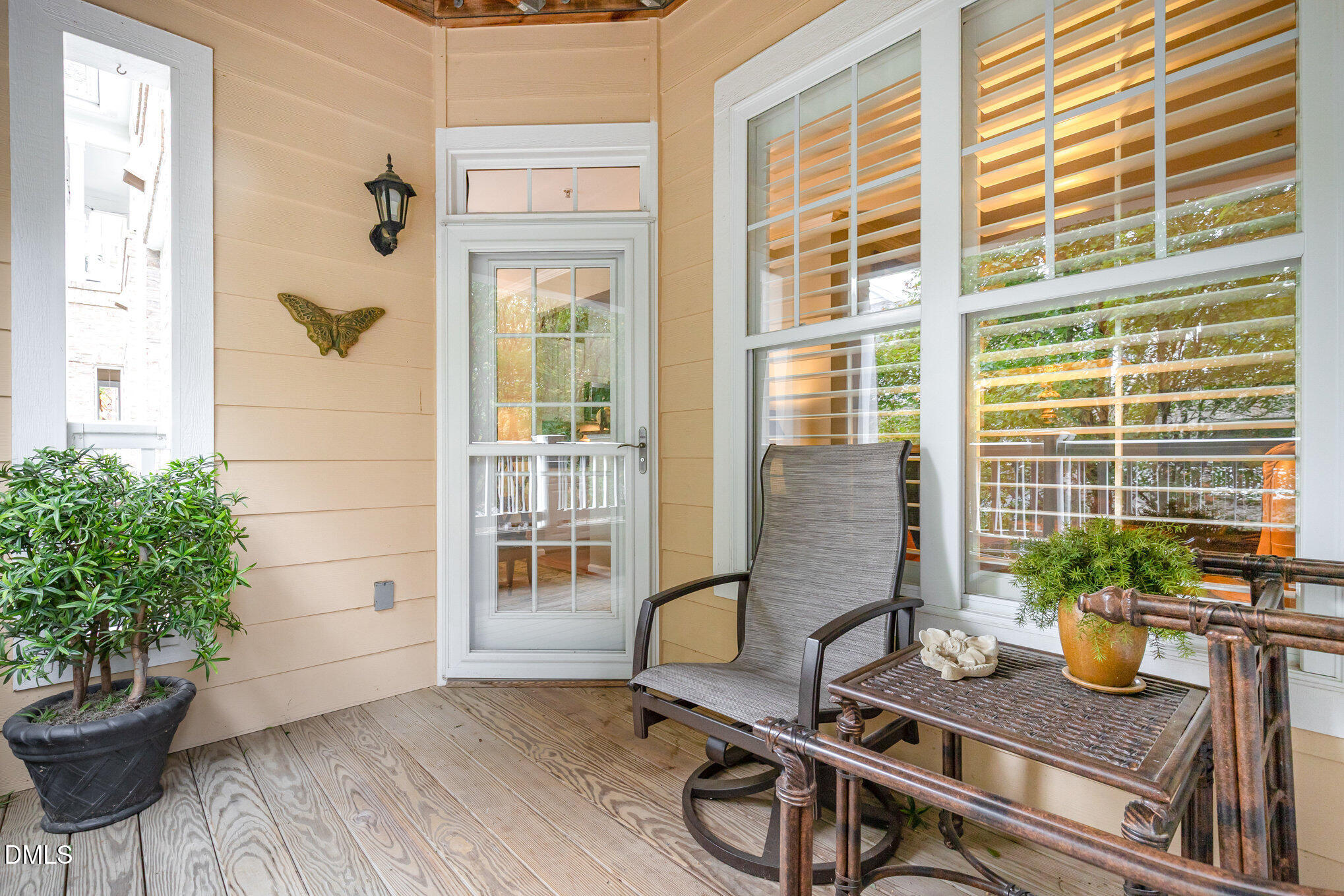3121 Hemlock Forest Circle, Unit 203 Raleigh, NC 27612 - Photo 25 of 33 a dining room with furniture and potted plants